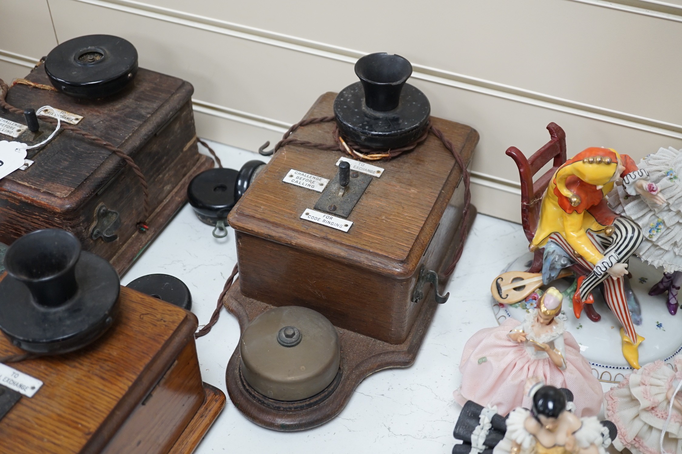 Three Ericsson oak cased railway signal box telephones, largest 30cms long